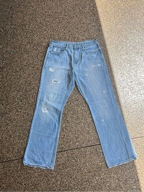 Light Blue Distressed Bootcut Jeans